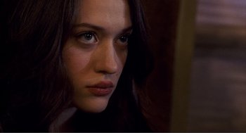 Movie still from “Nick and Norah's Infinite Playlist” (2008), directed by Peter Sollett – A person with long hair; Close Up shot, Low angle