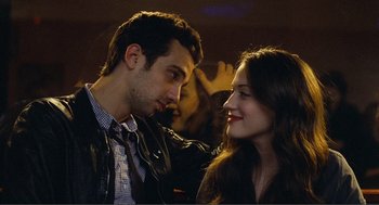 Movie still from “Nick and Norah's Infinite Playlist” (2008), directed by Peter Sollett – A man and a woman looking at one another; Close Up shot, Over the shoulder angle