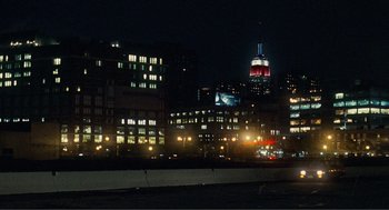 Movie still from “Nick and Norah's Infinite Playlist” (2008), directed by Peter Sollett – A view of a city at night from across the street; Extreme Wide shot, Low angle