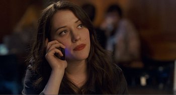 Movie still from “Nick and Norah's Infinite Playlist” (2008), directed by Peter Sollett – A beautiful young lady talking on a cell phone; Close Up shot, High angle