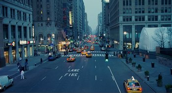 Movie still from “Nick and Norah's Infinite Playlist” (2008), directed by Peter Sollett – A city street filled with lots of traffic at night; Extreme Wide shot, High angle