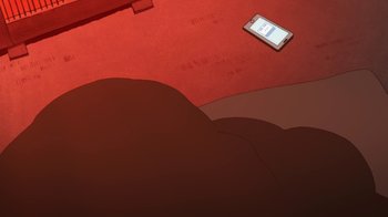 Movie still from “The Night Is Short, Walk on Girl” (2017), directed by Masaaki Yuasa – An image of a cell phone laying on the ground; Wide shot, Overhead angle