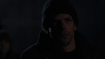 Movie still from “Night Moves” (2013), directed by Kelly Reichardt – A man in a black jacket and a black hat; Close Up shot, Over the shoulder angle