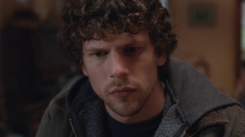 Movie still from “Night Moves” (2013), directed by Kelly Reichardt – A person wearing a jacket; Close Up shot, Over the shoulder angle