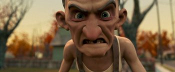 Movie still from “Monster House” (2006), directed by Gil Kenan – An evil looking cartoon character with blue eyes; Close Up shot, Low angle
