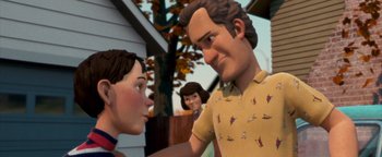 Movie still from “Monster House” (2006), directed by Gil Kenan – A man and a woman standing next to each other in front of a house; Medium shot, Over the shoulder angle