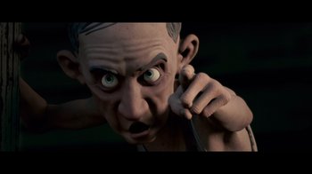 Movie still from “Monster House” (2006), directed by Gil Kenan – An animation of a man talking on a cell phone; Close Up shot, Low angle