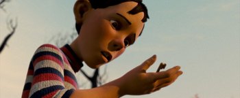 Movie still from “Monster House” (2006), directed by Gil Kenan – A boy's face and hand; Close Up shot, Low angle