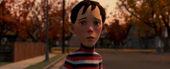 Movie still from “Monster House” (2006), directed by Gil Kenan – A boy with a striped shirt is standing in the street; Close Up shot, Low angle