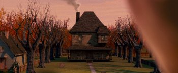 Movie still from “Monster House” (2006), directed by Gil Kenan – An image of an old house in the middle of the day; Extreme Wide shot, High angle