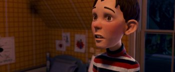 Movie still from “Monster House” (2006), directed by Gil Kenan – The face of a boy doll; Close Up shot, Over the shoulder angle