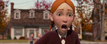 Movie still from “Monster House” (2006), directed by Gil Kenan – A girl with pigtails is looking surprised; Close Up shot, Over the shoulder angle