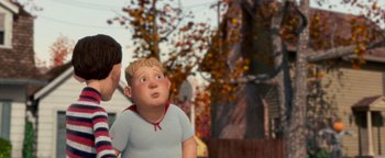 Movie still from “Monster House” (2006), directed by Gil Kenan – A cartoon of a boy looking up at an older man; Medium shot, Over the shoulder angle