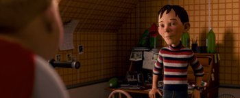 Movie still from “Monster House” (2006), directed by Gil Kenan – A boy is standing in front of a camera; Medium shot, Low angle