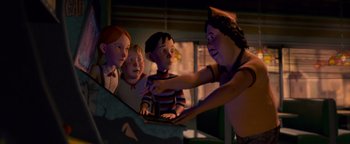 Movie still from “Monster House” (2006), directed by Gil Kenan – A group of people standing next to each other in a room; Medium shot, High angle
