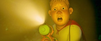 Movie still from “Monster House” (2006), directed by Gil Kenan – A boy's face with an object behind him; Close Up shot, Low angle