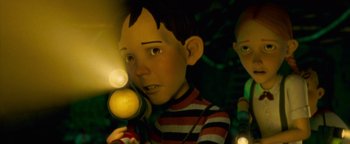 Movie still from “Monster House” (2006), directed by Gil Kenan – A boy with a magnifying glass in his hand; Close Up shot, Low angle