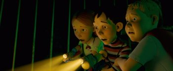 Movie still from “Monster House” (2006), directed by Gil Kenan – A couple of people that are playing a video game; Medium shot, Low angle