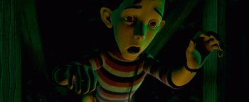 Movie still from “Monster House” (2006), directed by Gil Kenan – A cartoon character's eyes and mouth; Medium shot, High angle
