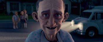 Movie still from “Monster House” (2006), directed by Gil Kenan – An old man is smiling for the camera; Close Up shot, Low angle