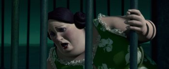 Movie still from “Monster House” (2006), directed by Gil Kenan – A woman's face in a green dress; Close Up shot, Low angle