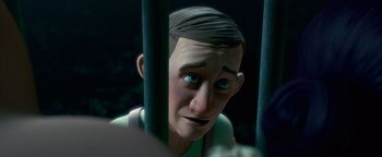 Movie still from “Monster House” (2006), directed by Gil Kenan – A man in a jail cell with his eyes wide open; Close Up shot, Over the shoulder angle
