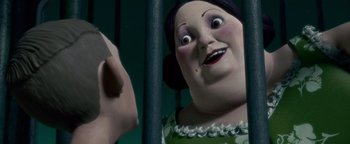 Movie still from “Monster House” (2006), directed by Gil Kenan – A woman's face in front of a fence; Close Up shot, Over the shoulder angle