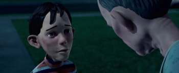 Movie still from “Monster House” (2006), directed by Gil Kenan – The head and face of a cartoon character; Close Up shot, Over the shoulder angle