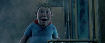 Movie still from “Monster House” (2006), directed by Gil Kenan – A child's face in a dark room; Medium shot, Low angle