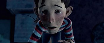 Movie still from “Monster House” (2006), directed by Gil Kenan – A cartoon character with a spider on his ear; Close Up shot, Low angle
