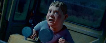 Movie still from “Monster House” (2006), directed by Gil Kenan – A boy is holding a tennis racquet in his hand; Close Up shot, High angle
