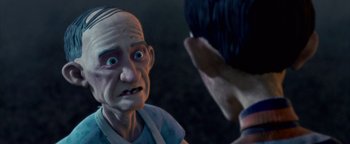 Movie still from “Monster House” (2006), directed by Gil Kenan – An old man talking to a young man in a dark room; Close Up shot, Over the shoulder angle