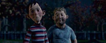 Movie still from “Monster House” (2006), directed by Gil Kenan – A couple of people standing next to each other; Medium shot, Low angle