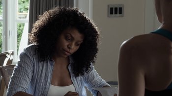 Movie still from “No Good Deed” (2014), directed by Sam Miller – A woman sitting in front of a mirror looking down; Close Up shot, Over the shoulder angle