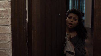 Movie still from “No Good Deed” (2014), directed by Sam Miller – A woman standing next to a wooden wall; Medium shot, Over the shoulder angle