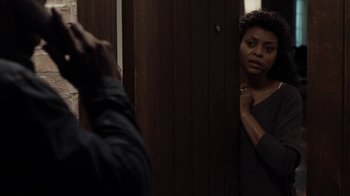 Movie still from “No Good Deed” (2014), directed by Sam Miller – A woman standing in front of a mirror looking in the mirror; Medium shot, Over the shoulder angle
