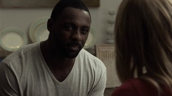 Movie still from “No Good Deed” (2014), directed by Sam Miller – A man and a woman are talking to each other; Close Up shot, Over the shoulder angle