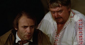 Movie still from “Nosferatu the Vampyre” (1979), directed by Werner Herzog – Two men are standing next to each other; Close Up shot, Over the shoulder angle