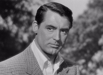 Movie still from “Notorious” (1946), directed by Alfred Hitchcock – An old black and white photo of cary grant; Close Up shot, Over the shoulder angle