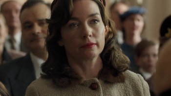 Movie still from “Novitiate” (2017), directed by Maggie Betts – A person wearing a coat; Close Up shot, Over the shoulder angle