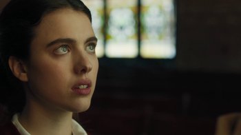 Movie still from “Novitiate” (2017), directed by Maggie Betts – A person with green eyes; Close Up shot, Over the shoulder angle