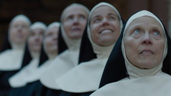 Movie still from “Novitiate” (2017), directed by Maggie Betts – A group of nuns standing next to each other; Close Up shot, High angle