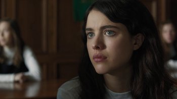 Movie still from “Novitiate” (2017), directed by Maggie Betts – A person with long black hair; Close Up shot, Low angle