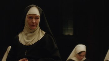 Movie still from “Novitiate” (2017), directed by Maggie Betts – A nun with a cross on her head and a nun with a cross on her chest; Close Up shot, Low angle