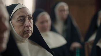Movie still from “Novitiate” (2017), directed by Maggie Betts – A group of three women dressed in nun's clothes; Close Up shot, Over the shoulder angle