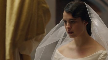 Movie still from “Novitiate” (2017), directed by Maggie Betts – A woman wearing a veil looking into a mirror; Close Up shot, Over the shoulder angle