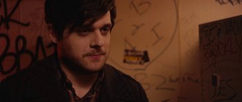 Movie still from “Obvious Child” (2014), directed by Gillian Robespierre – A person wearing a jacket; Close Up shot, Over the shoulder angle