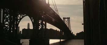 Movie still from “Obvious Child” (2014), directed by Gillian Robespierre – A view of a bridge from the water; Extreme Wide shot, Low angle