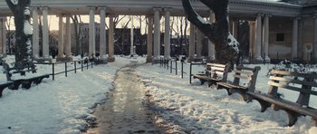 Movie still from “Obvious Child” (2014), directed by Gillian Robespierre – A park bench in the middle of a snowy park; Extreme Wide shot, High angle