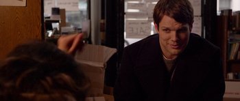 Movie still from “Obvious Child” (2014), directed by Gillian Robespierre – A man sitting at a table in front of a woman; Close Up shot, Over the shoulder angle